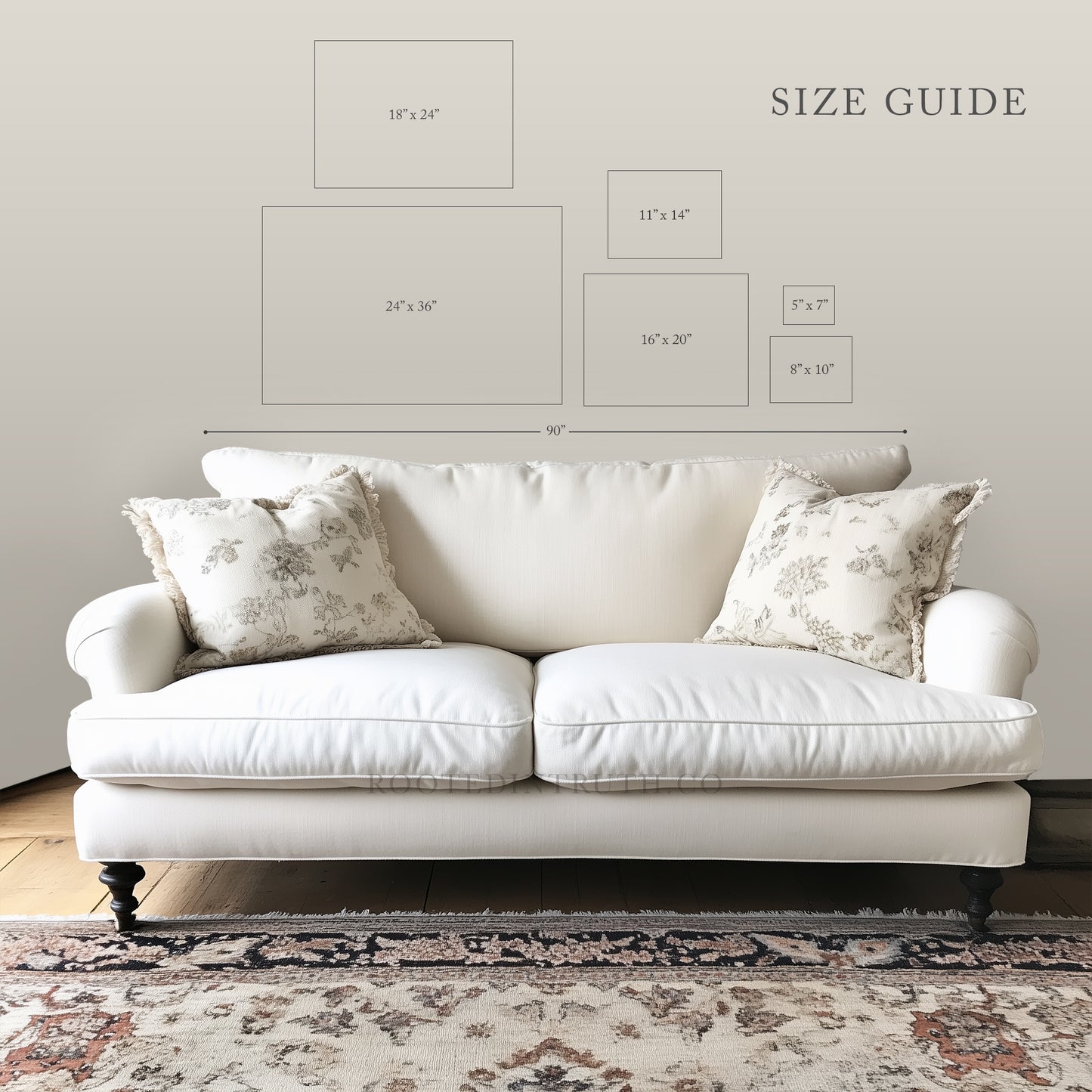 a white couch sitting on top of a wooden floor