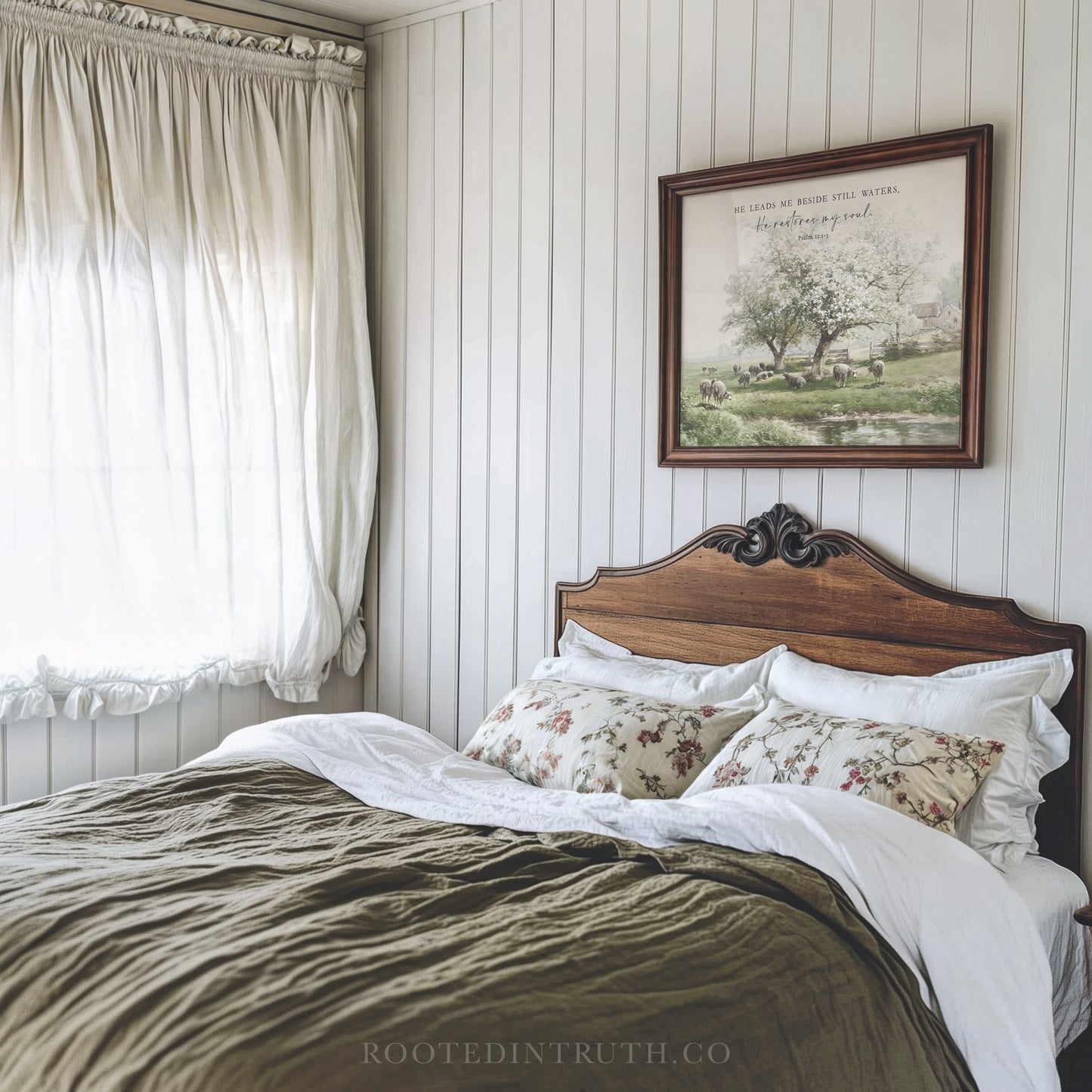 a bedroom with a bed and a picture on the wall