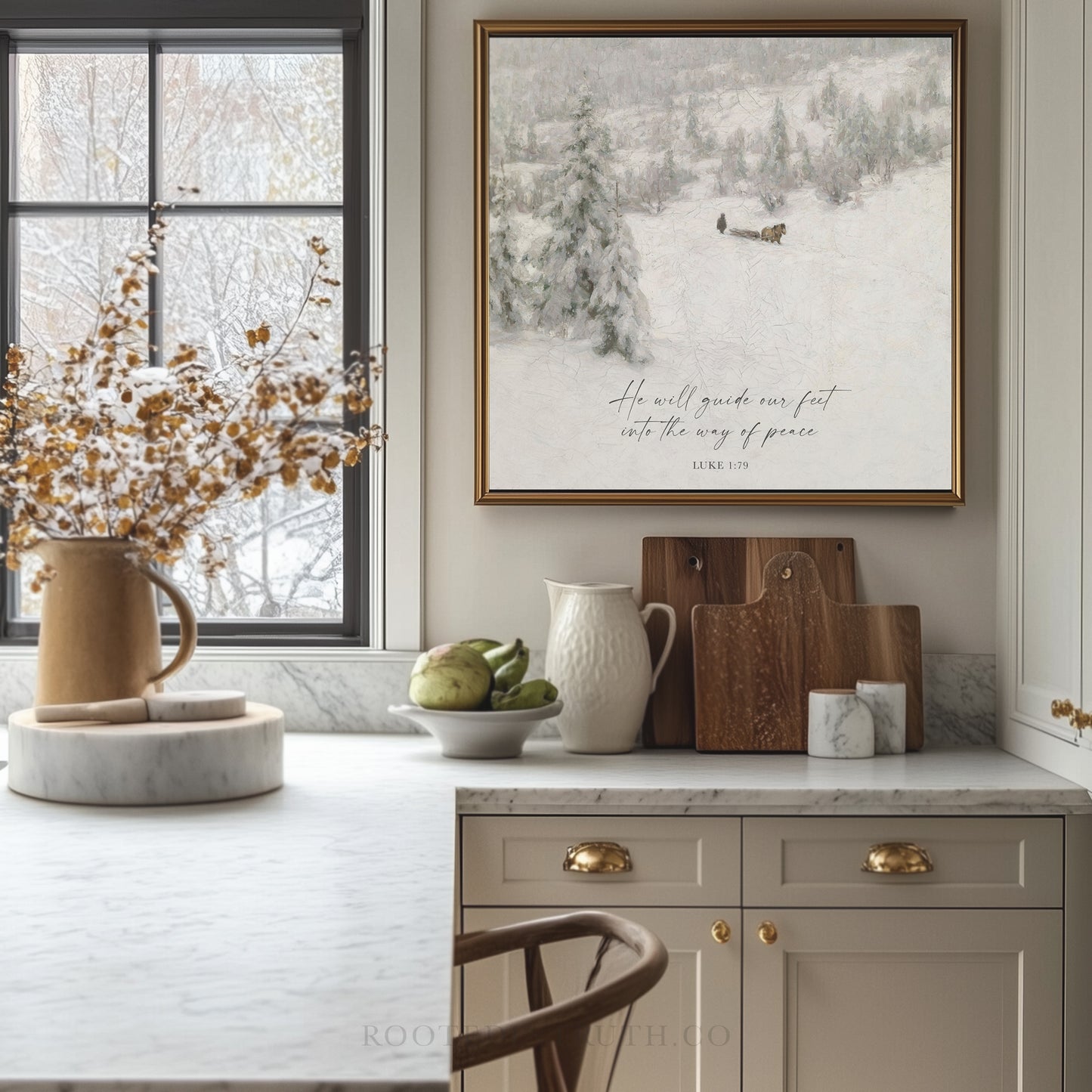a kitchen with a white counter top and a painting on the wall