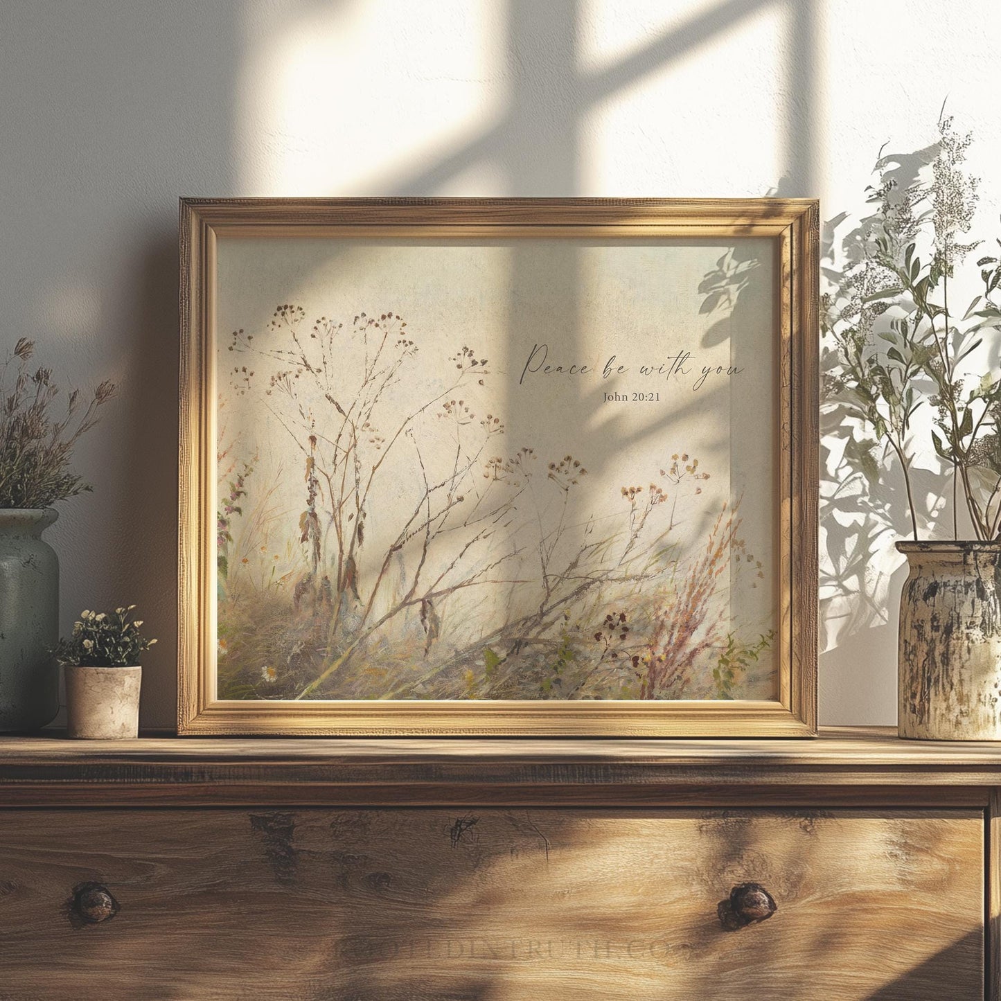 a picture frame sitting on top of a dresser