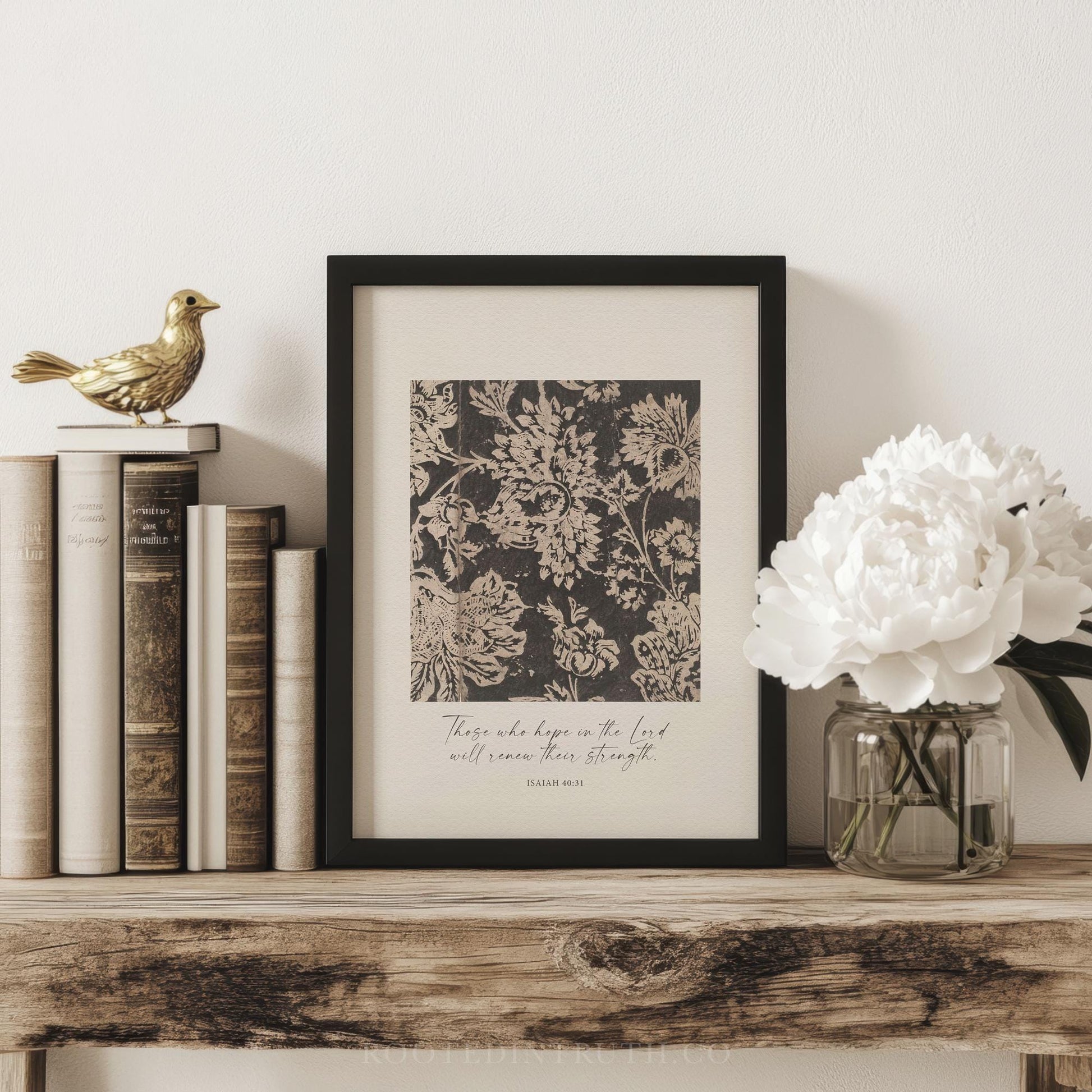 a picture of a vase with flowers and books on a shelf