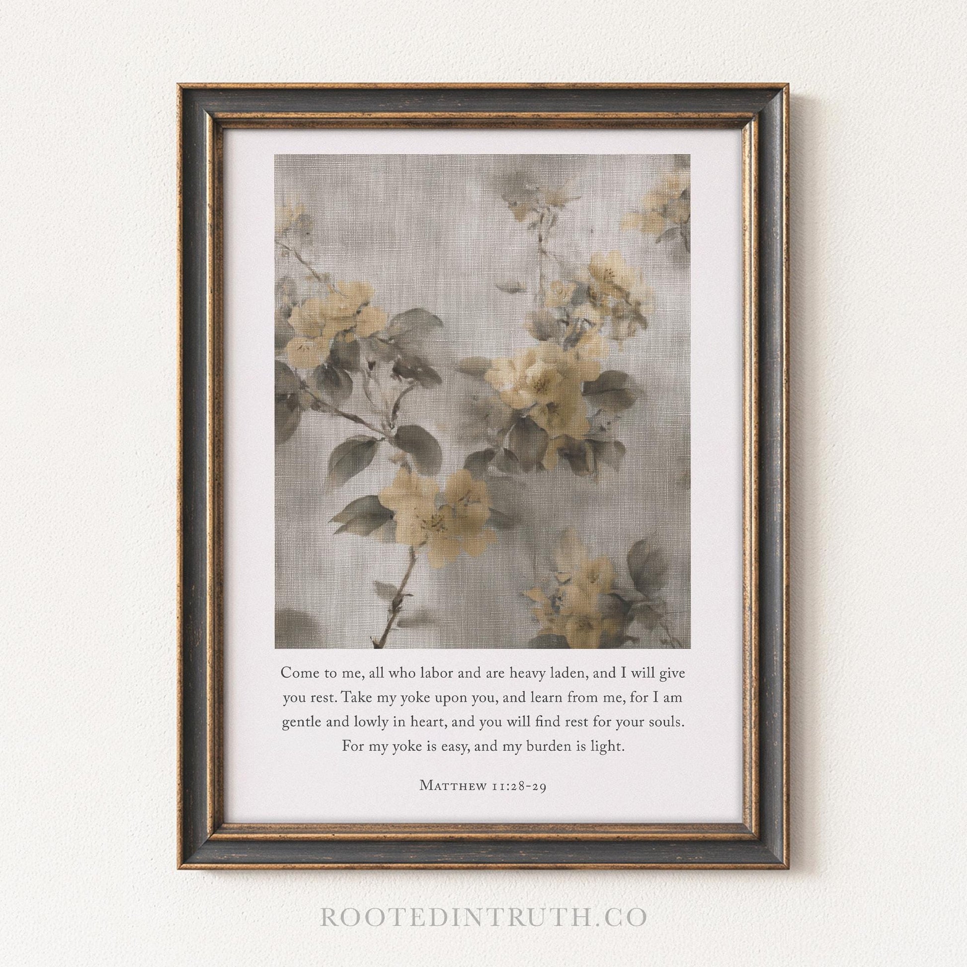 The image is a framed print featuring a floral design with yellow flowers against a light gray background. The text below the image provides a biblical verse from the book of Matthew, referencing the importance of labor and the value of one's heart.