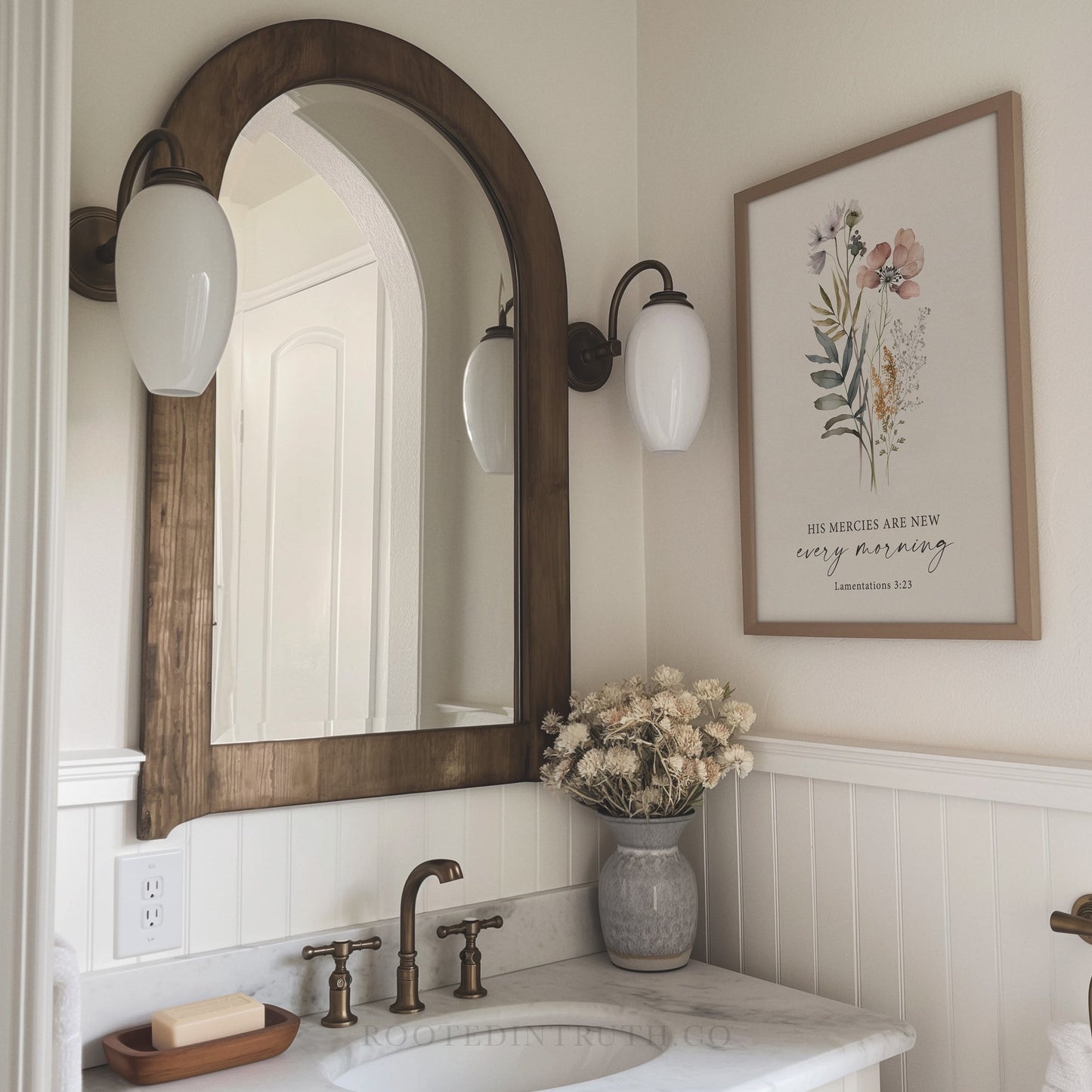 A Christian vintage style floral wall art print with a scripture bible verse in a bathroom with a sink and a mirror