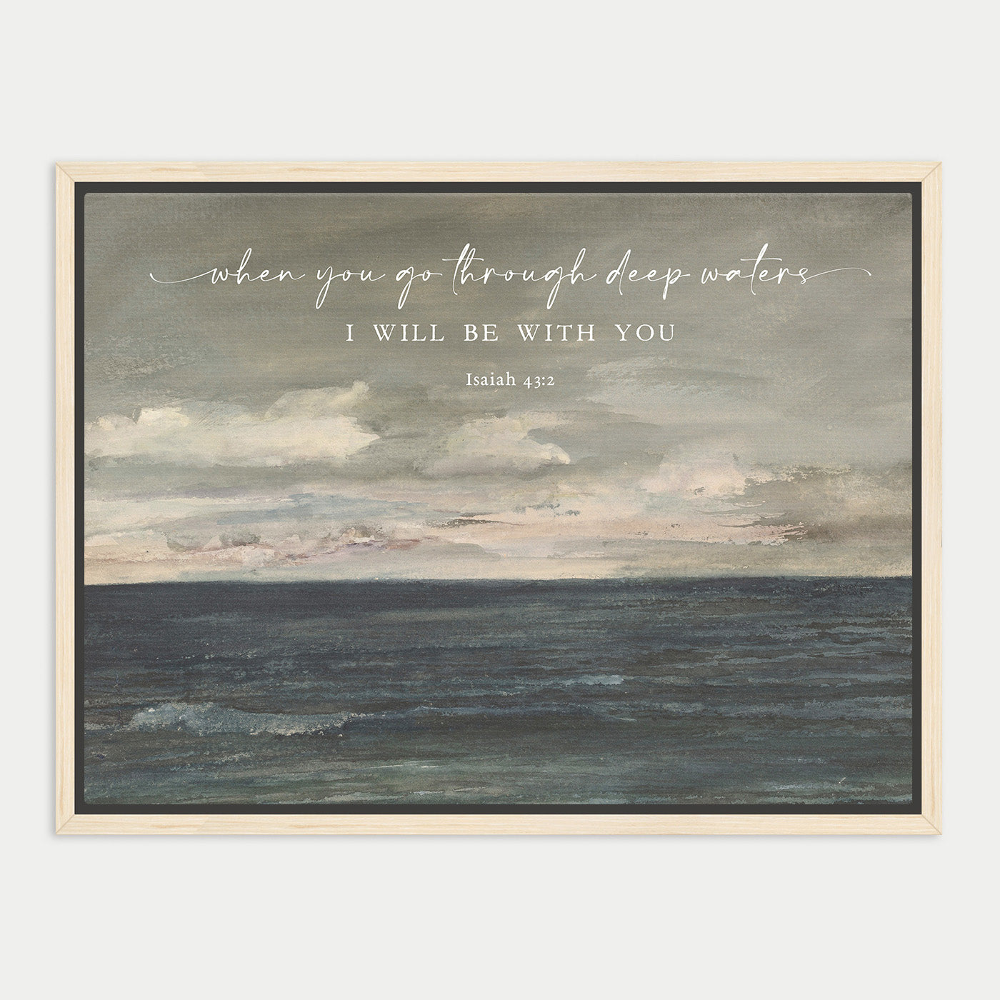 The image is a framed painting depicting a serene ocean scene with a cloudy sky above. The text overlay reads "when you go through deep waters, I will be with you" and is attributed to Isaiah 43:13.