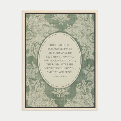 The image is a framed print featuring a floral pattern and a central text quote from the Bible, specifically the Book of Common Prayer.