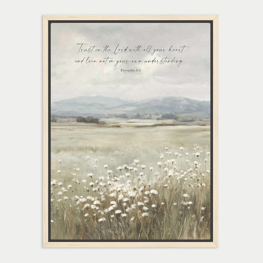The image is a framed print depicting a serene landscape with a field of white flowers in the foreground and a mountainous background. The text overlay reads "Trust in the Lord with all your heart and lean not on your own understanding. Proverbs 3:5".
