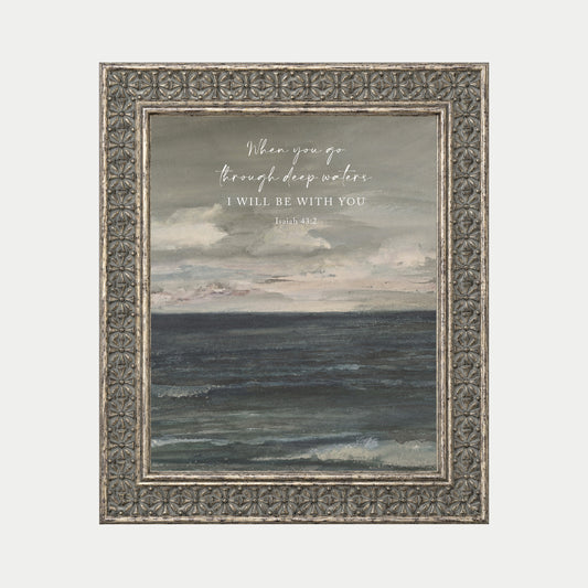 The image is a framed painting depicting a serene ocean scene with a cloudy sky above.