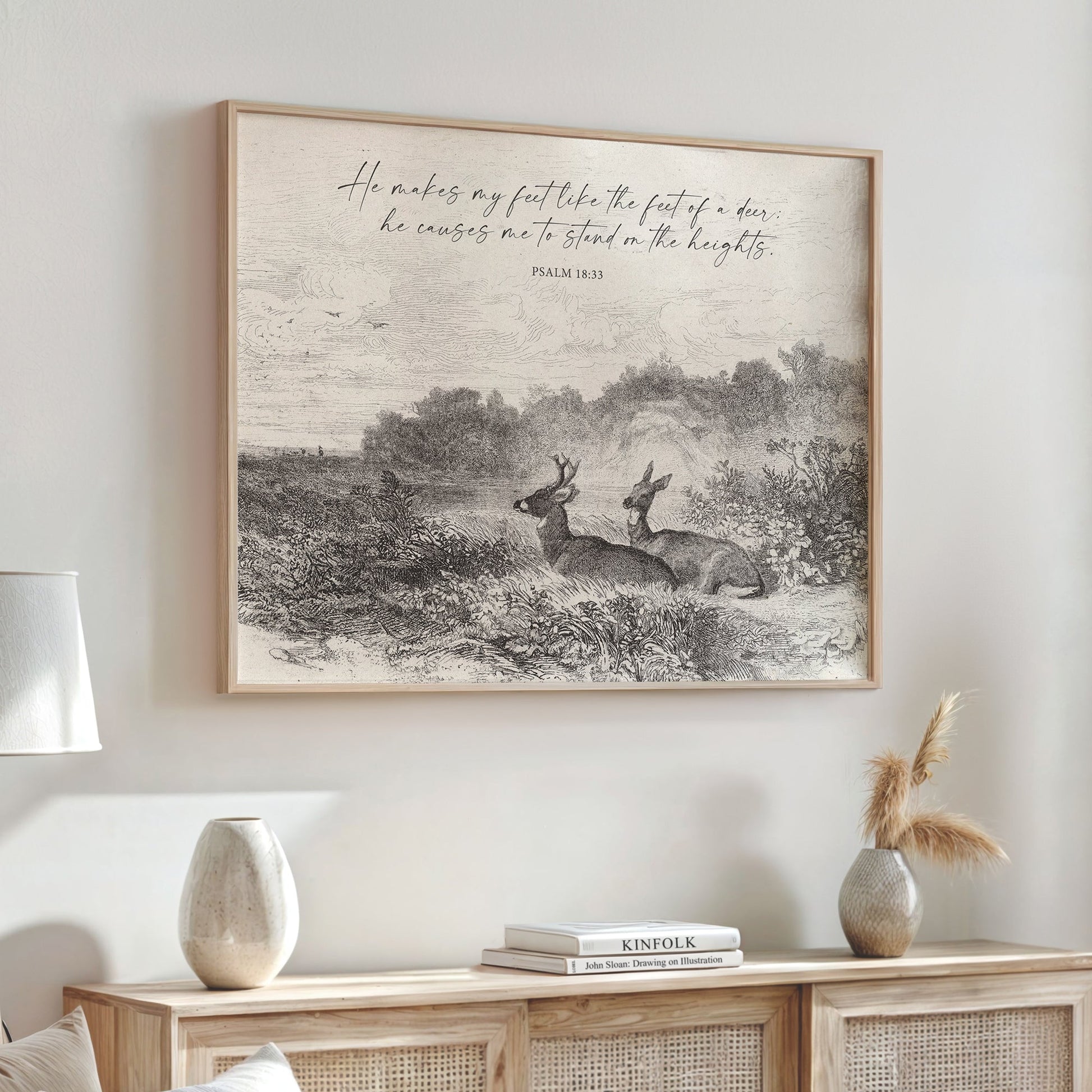a framed black and white illustration of two deer in a field, with a text overlay that reads "He makes my feet like the feet of a deer. He causes me to stand on the feet of the deer."