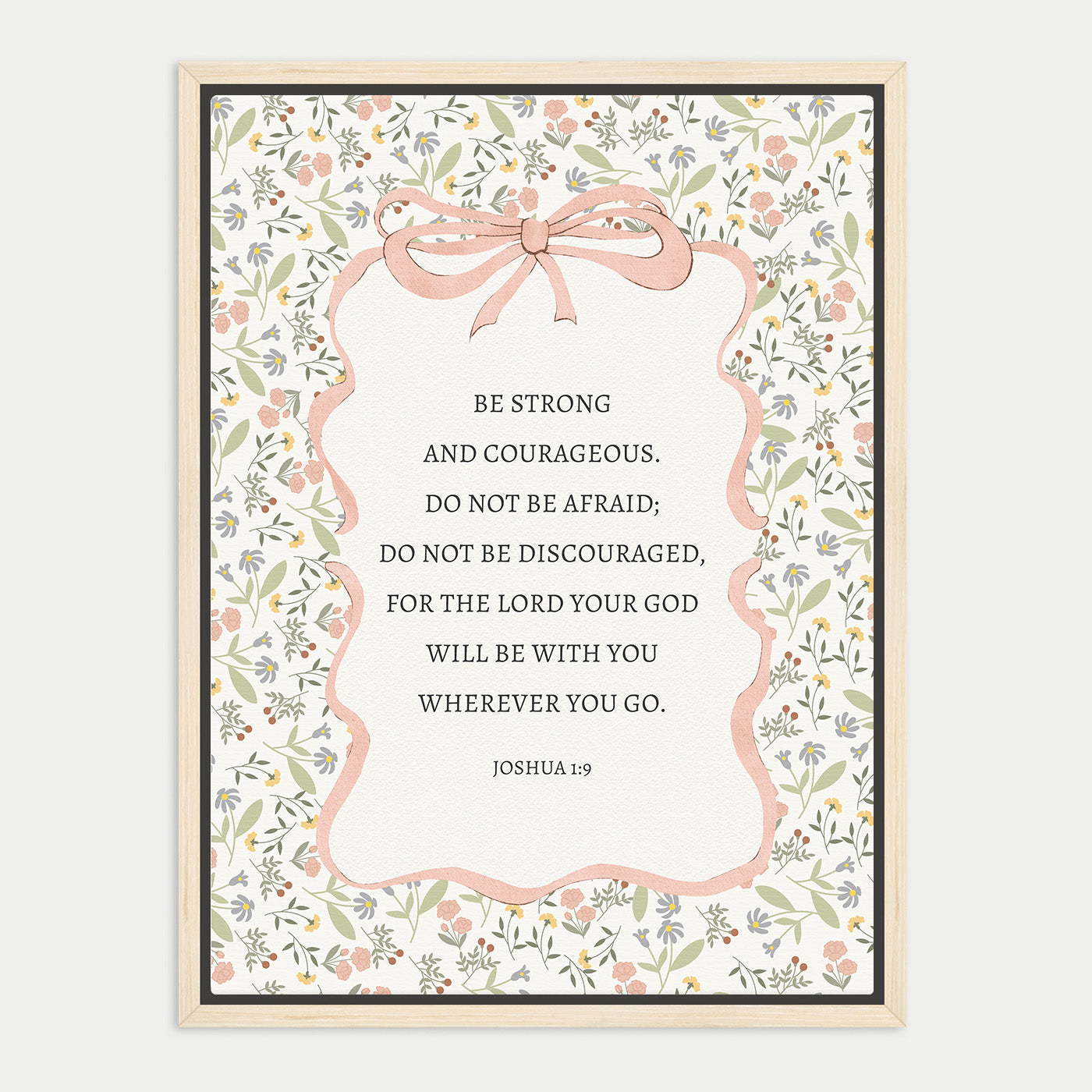 The image is a framed print featuring a Bible verse from Joshua 1:9, which encourages being strong and Courageous, not being afraid, not being discouraged, and for the Lord with you, wherever you go.