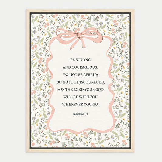 The image is a framed print featuring a Bible verse from Joshua 1:9, which encourages being strong and Courageous, not being afraid, not being discouraged, and for the Lord with you, wherever you go.