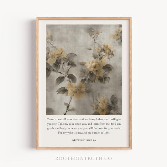 The image is a framed print featuring a floral design with yellow flowers against a gray background. The text below the image provides a biblical verse from Matthew 22:8-29.