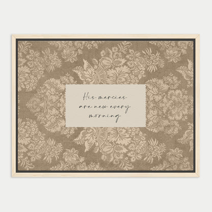 a framed print with a floral pattern and a handwritten message in the center.