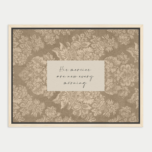 a framed print with a floral pattern and a handwritten message in the center.