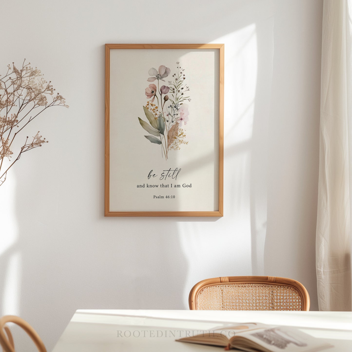 a framed print of a floral design hanging on a wall, with a quote from Psalm 19:1 below it.