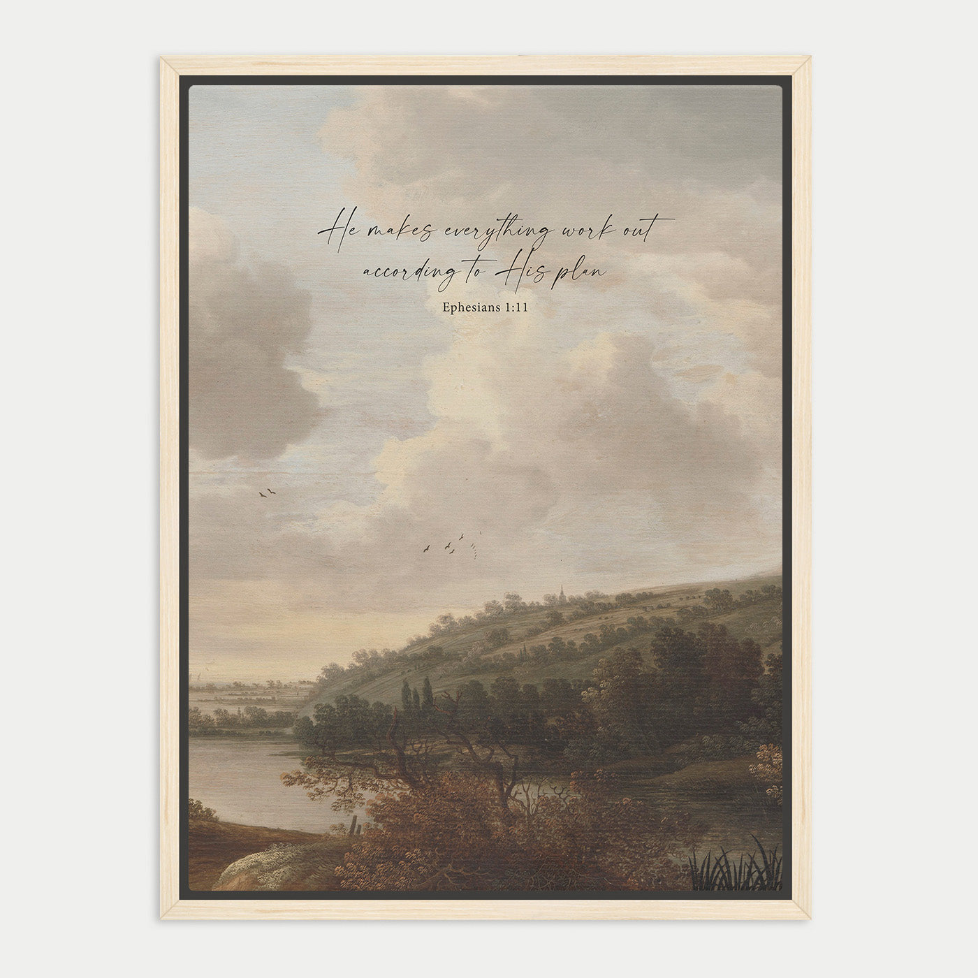 The image is a framed painting depicting a serene landscape with a body of water, trees, and a cloudy sky. The text overlay reads "He makes everything work out according to His plan" and is located in the top right corner of the painting.