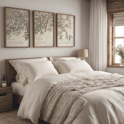 a bed with a white comforter and two pictures on the wall