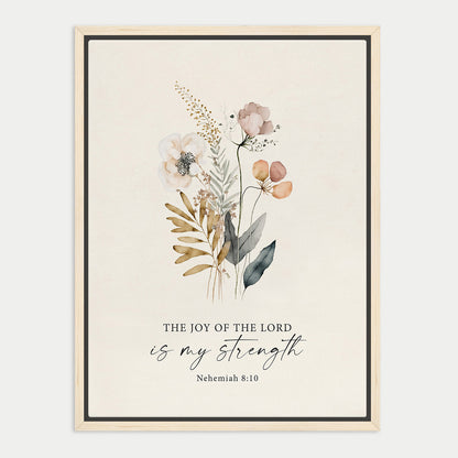 The image is a framed print featuring a floral illustration with the text "The joy of the Lord is my strength" and the Bible verse "Nehemiah 8:10" below it.