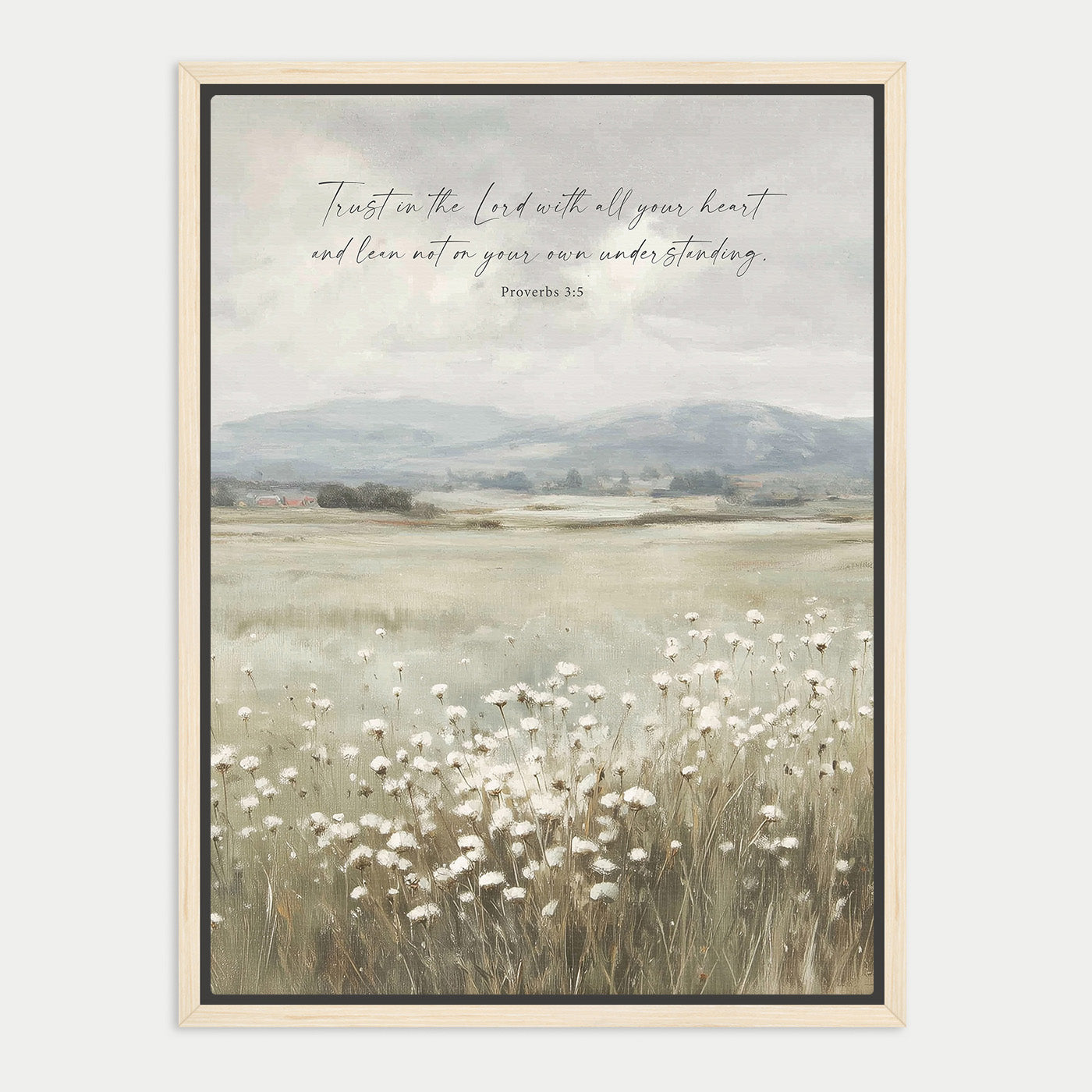 The image is a framed print depicting a serene landscape with a field of white flowers in the foreground and a mountainous background. The text overlay reads "Trust in the Lord with all your heart and lean not on your own understanding. Proverbs 3:5".