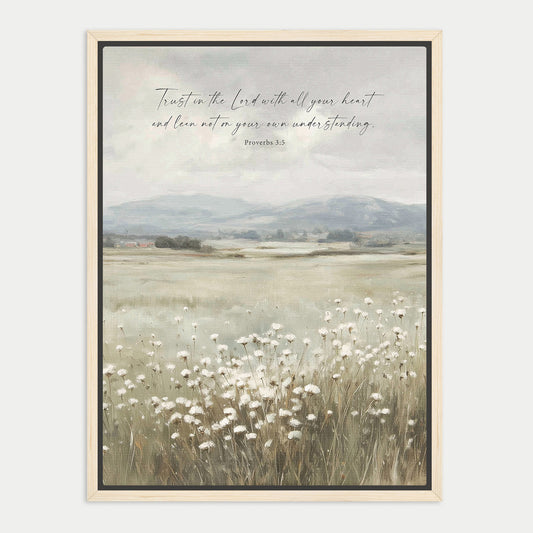 The image is a framed print depicting a serene landscape with a field of white flowers in the foreground and a mountainous background. The text overlay reads "Trust in the Lord with all your heart and lean not on your own understanding. Proverbs 3:5".