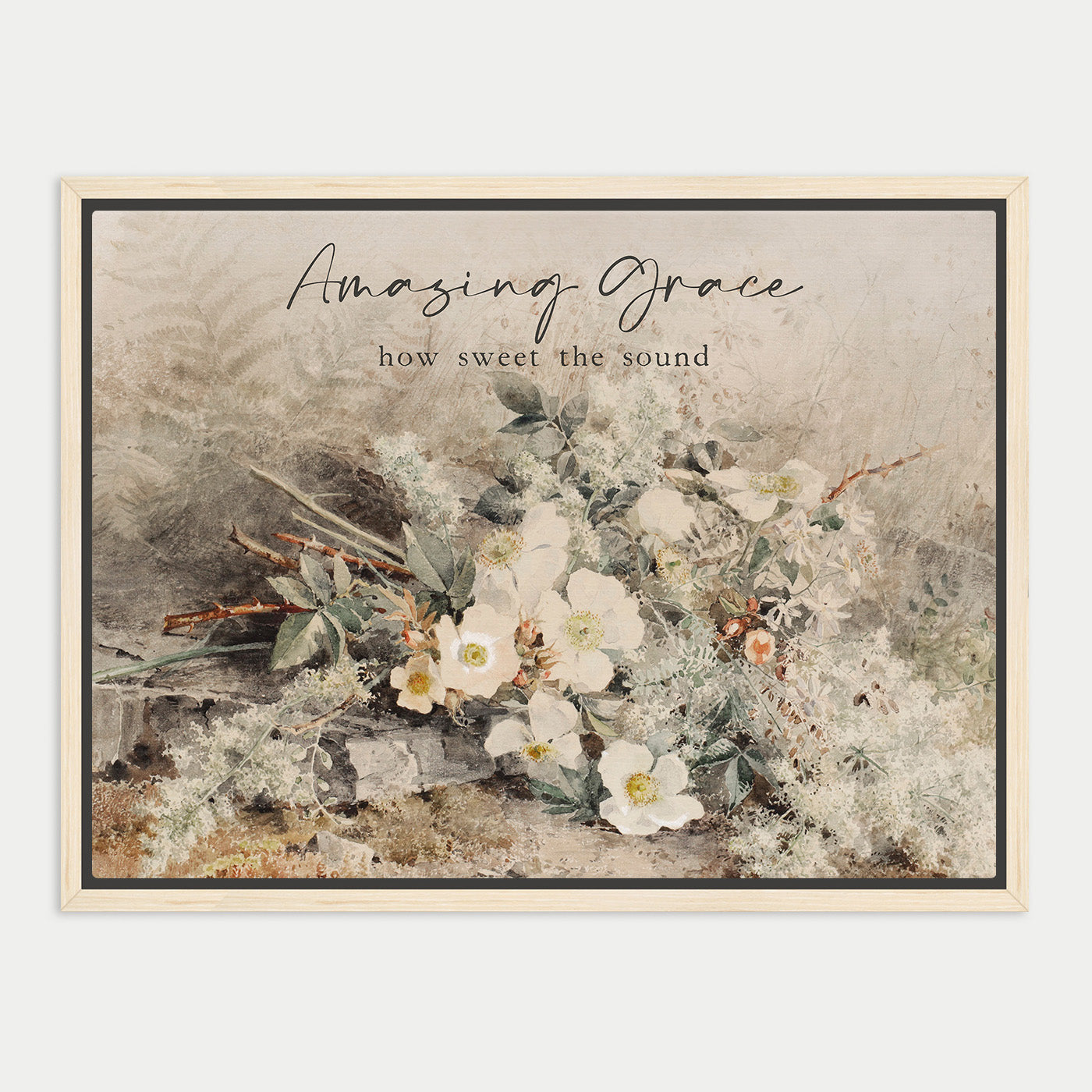 The image is a framed print featuring a floral arrangement with white flowers and greenery. The text above the print reads "Amazing Grace" and below it says "how sweet the sound".