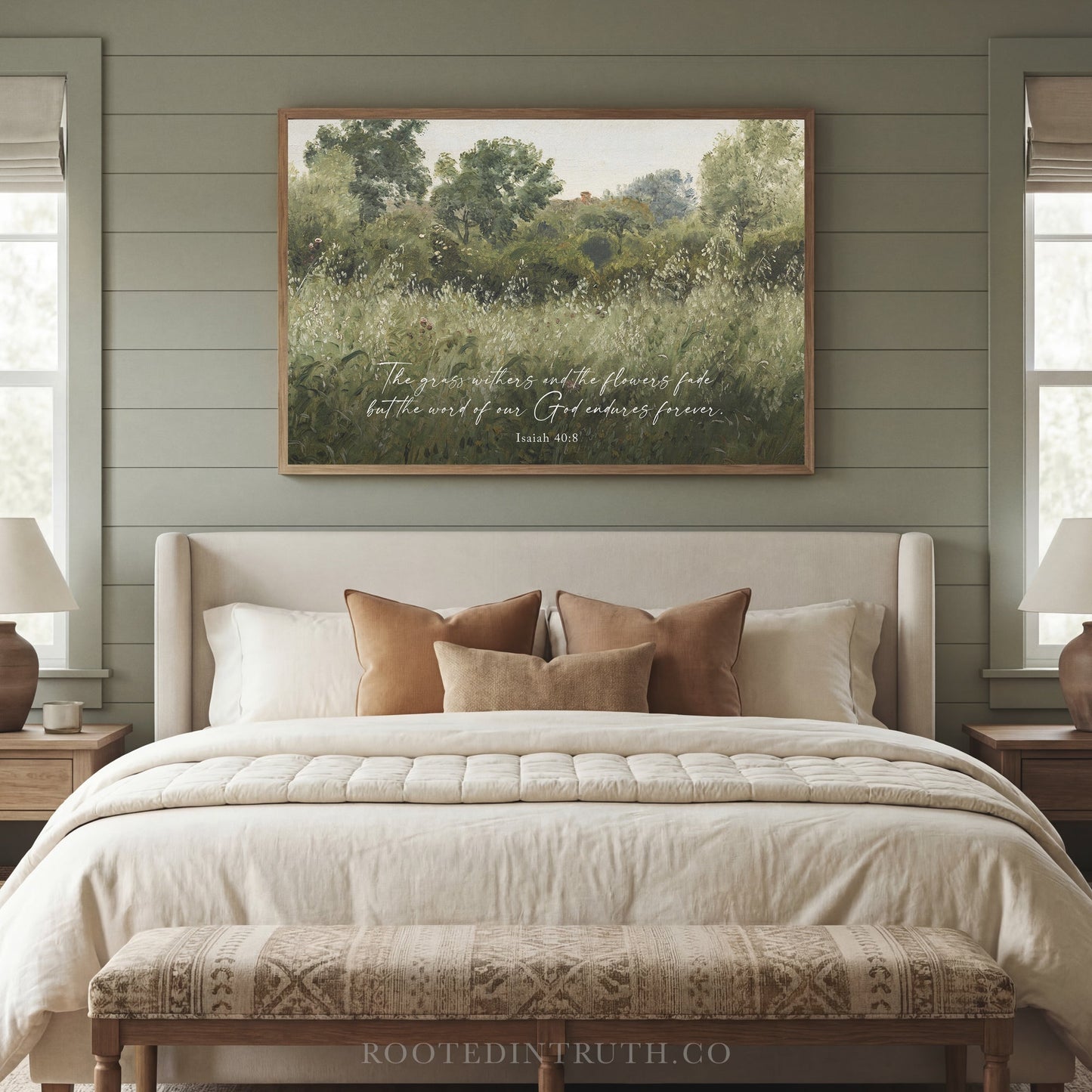 a serene bedroom scene with a large bed, a wooden bench, and a framed landscape painting hanging above it. The painting features a lush green field with trees and a clear sky. The bed is adorned with white linens and brown throw pillows, creating a cozy and inviting atmosphere. The wooden bench and nightstands provide additional storage and functionality to the space.