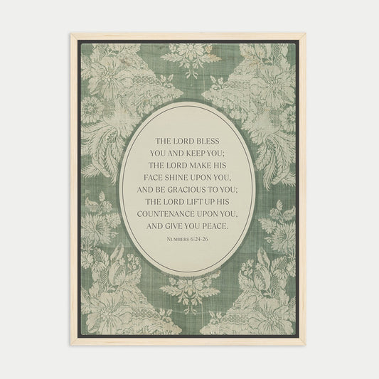 The image is a framed print featuring a floral pattern and a central text quote from the Bible, specifically the Book of Common Prayer.