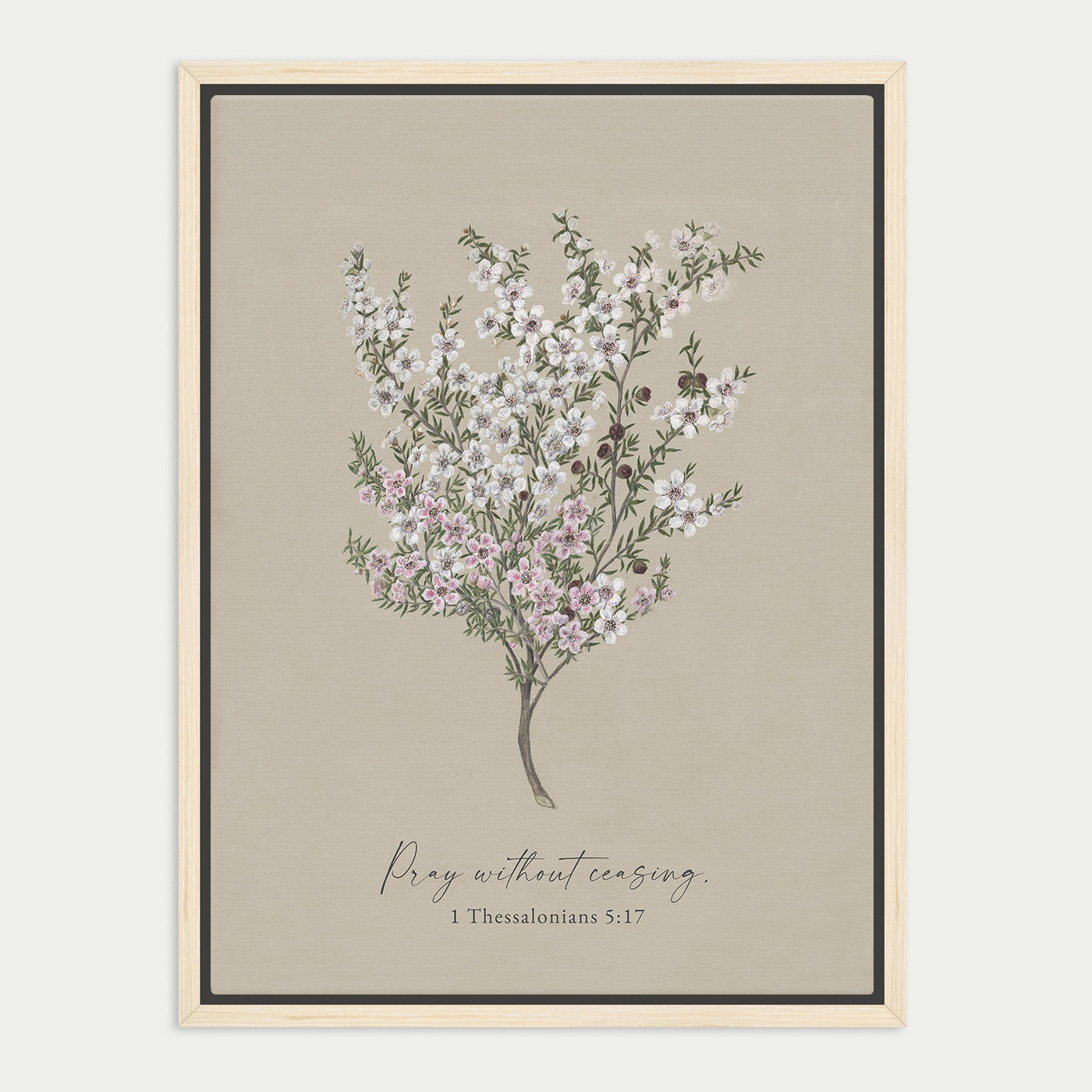 The image is a framed print featuring a detailed illustration of a tree with white flowers against a beige background. The text below the image reads "Pray without ceasing. 1 Thessalonians 5:17".
