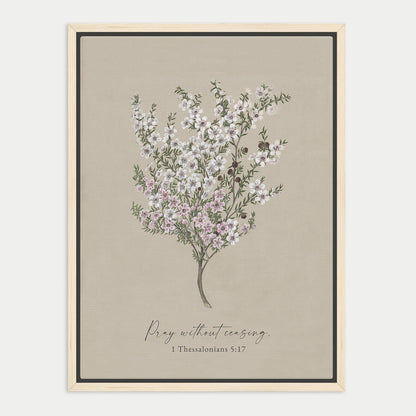 The image is a framed print featuring a detailed illustration of a tree with white flowers against a beige background. The text below the image reads "Pray without ceasing. 1 Thessalonians 5:17".