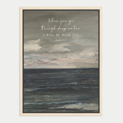 The image is a framed print featuring a seascape with a text overlay that reads "When you go through deep waters, I will be with you. Isaiah 45:2".