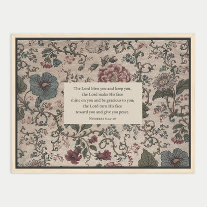 The image is a framed print featuring a floral pattern with a central text box containing a religious message.