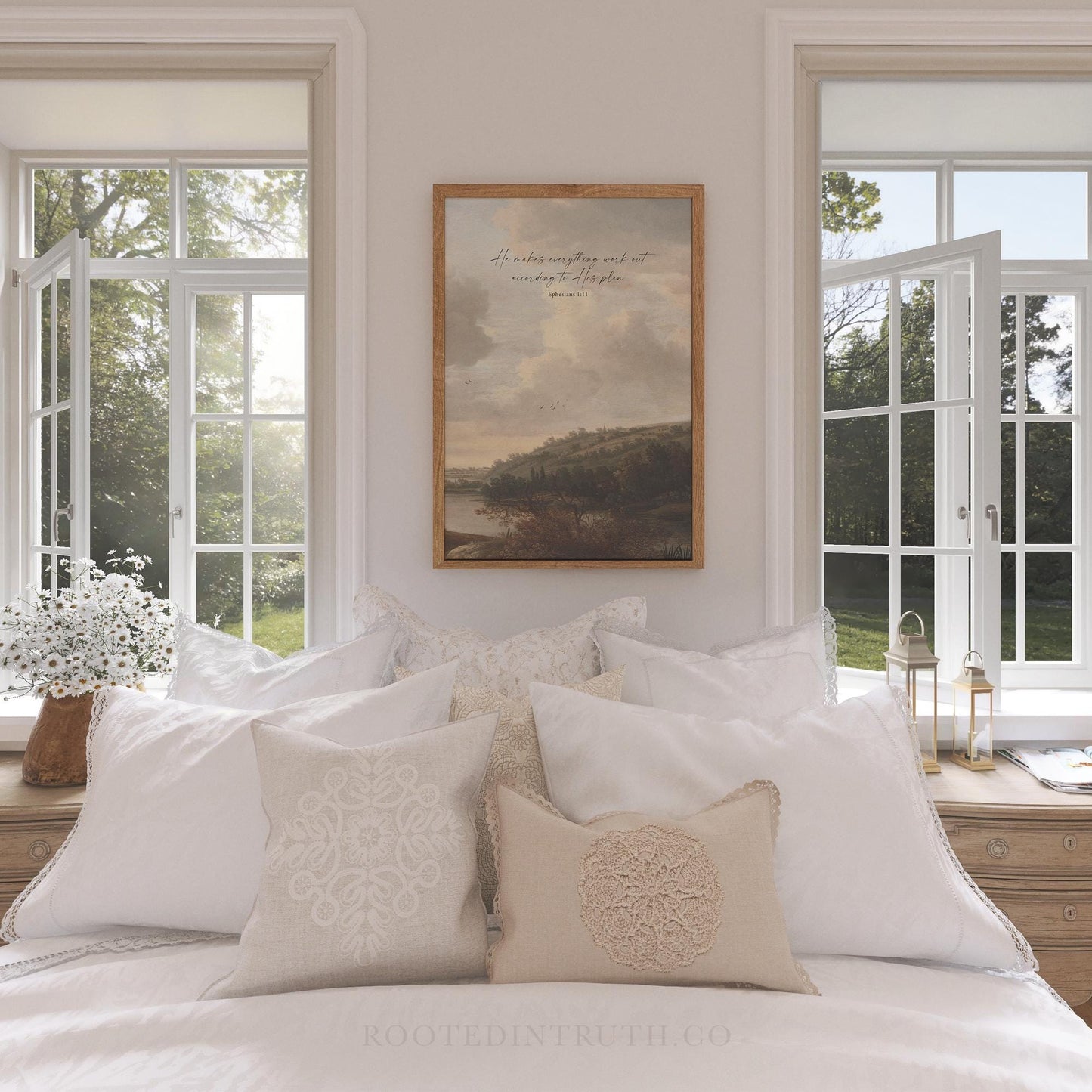 A Christian vintage wall art print with a scripture bible verse. In a bedroom with white pillows.