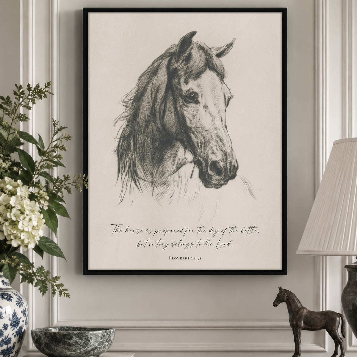 a framed black and white drawing of a horse's head, with a quote from the Bible below it.