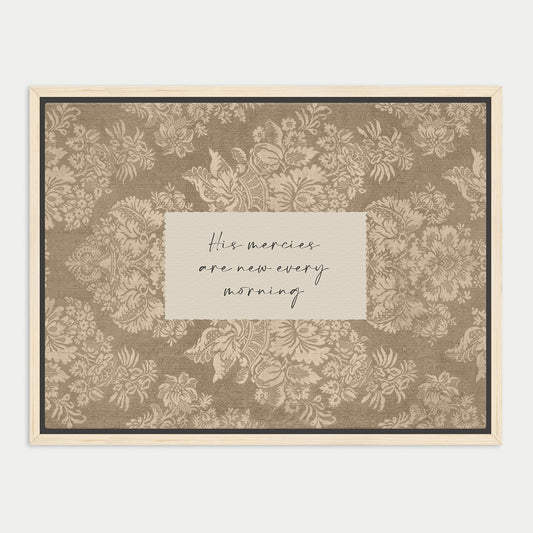 a framed print with a floral pattern and a handwritten message in the center.