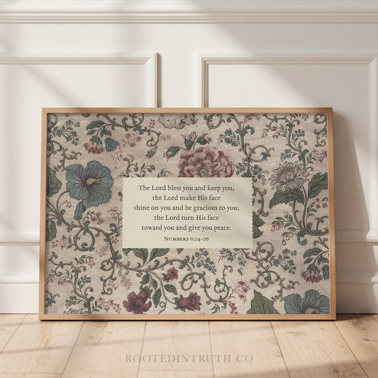 The image is a framed print with a floral pattern and a Bible verse from the book of Proverbs.