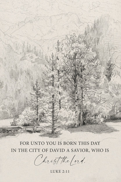 The image is a black and white illustration depicting a forest scene with trees and mountains in the background. The text overlay provides a biblical verse from the book of Luke 2:11, which reads "For unto you is born this day in the city of david a Savior, who is Christ the Lord."